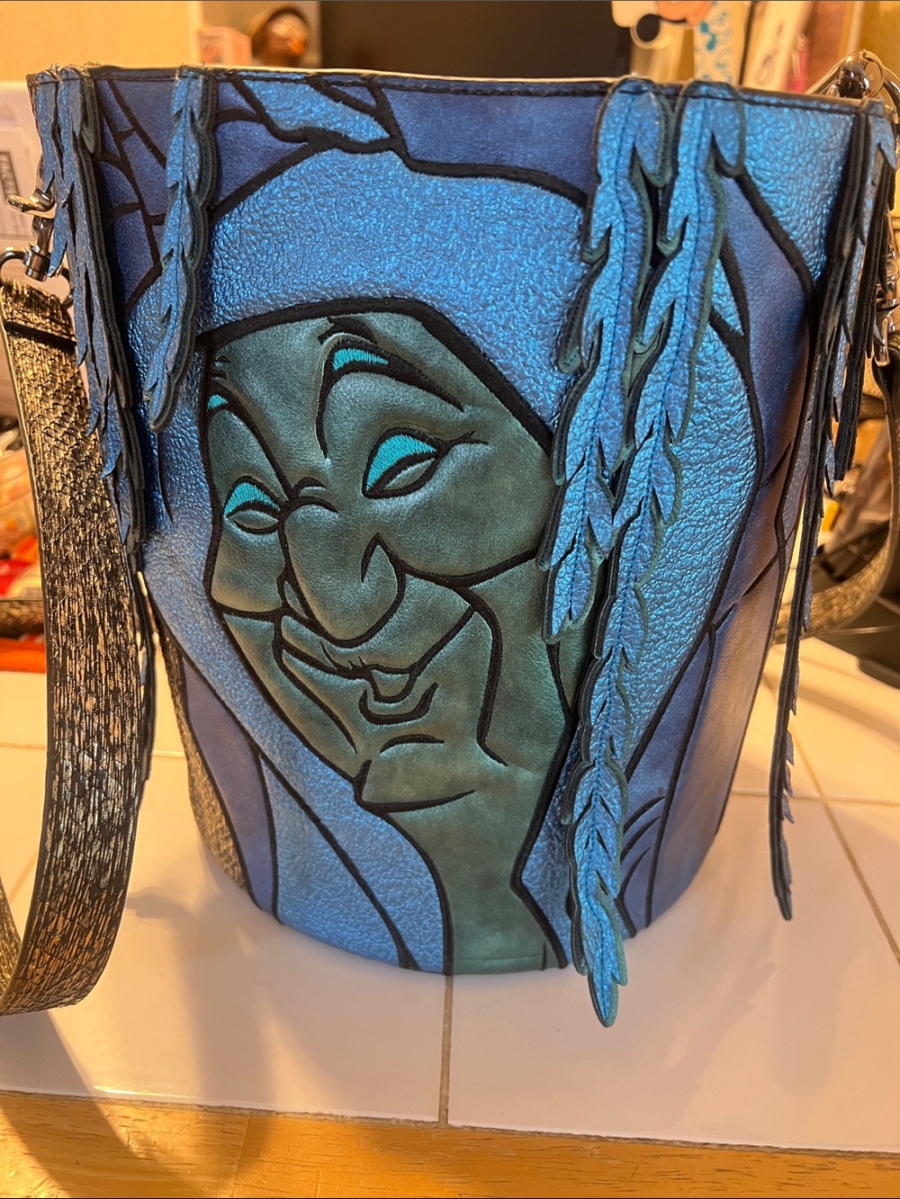 Danielle Nicole Shimmering Blue and Teal Face Bucket Shoulder Bag
